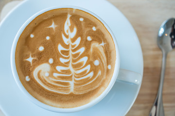 Cappuccino or latte coffee with tree shape