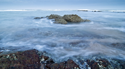 Beautiful seascape and rock in slow shutter speed