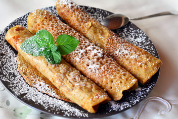 Crepes With Strawberry Jam On The Brown Plate. Pancakes.