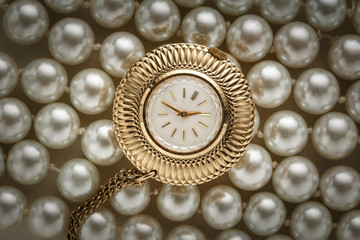 Watch on white pearl
