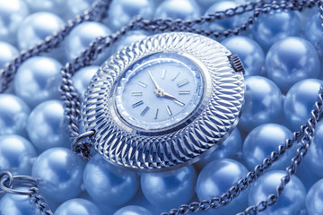 Watch on white pearl