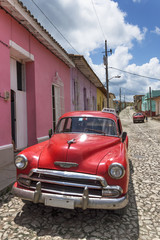 Classic american red car in Trinidad, Cuba