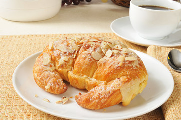 Custard filled almond croissant