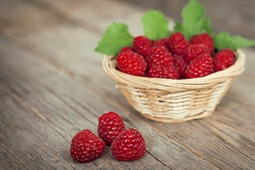 raspberries in a wooden bowl