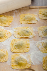 Homemade ravioli stuffed with spinach and ricotta