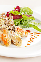 Fricassee with seafood and salad