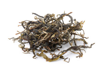 dry green tea on white background