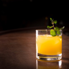 Screw driver cocktail with fresh mint
