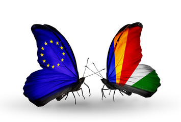 Two butterflies with flags EU and Seychelles