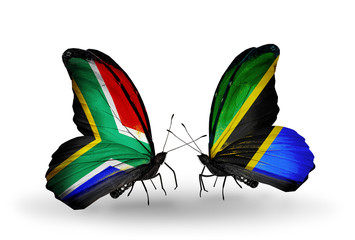 Two butterflies with flags South Africa and Tanzania