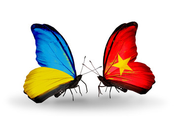 Two butterflies with flags Ukraine and Vietnam