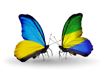 Two butterflies with flags Ukraine and Gabon