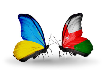 Two butterflies with flags Ukraine and Oman