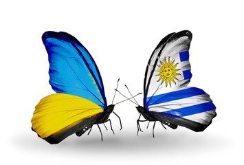 Two butterflies with flags  Ukraine and Uruguay