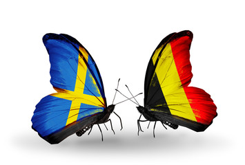 Two butterflies with flags Sweden and Belgium
