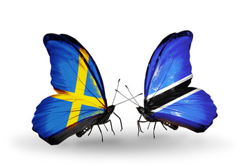 Two butterflies with flags Sweden and Botswana