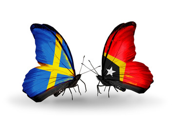Two butterflies with flags Sweden and East Timor