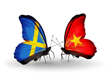 Two butterflies with flags Sweden and Vietnam