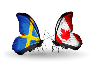 Two butterflies with flags Sweden and Canada