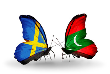 Two butterflies with flags Sweden and Maldives