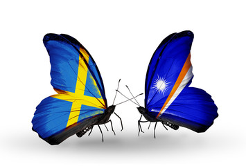 Two butterflies with flags Sweden and Marshall islands
