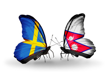Two butterflies with flags Sweden and Nepal