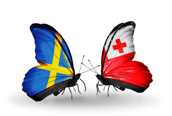 Two butterflies with flags Sweden and Tonga