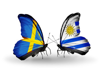 Two butterflies with flags Sweden and Uruguay