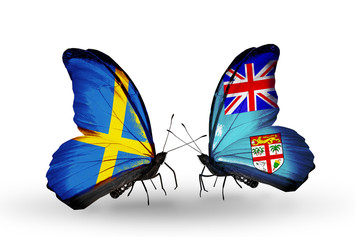 Two butterflies with flags Sweden and Fiji