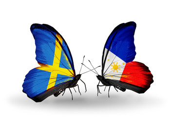 Two butterflies with flags Sweden and Philippines