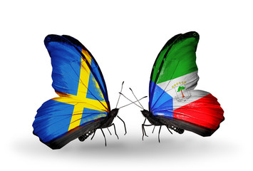 Two butterflies with flags Sweden and Equatorial Guinea