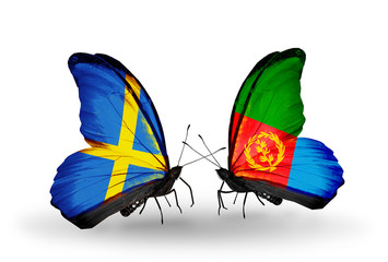 Two butterflies with flags Sweden and Eritrea