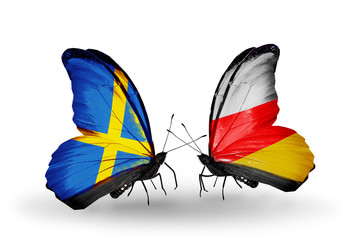 Two butterflies with flags Sweden and South Ossetia