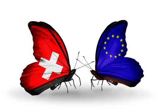 Two butterflies with flags Switzerland and EU