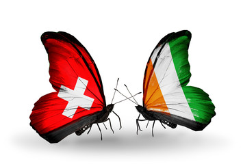 Two butterflies with flags Switzerland and Cote Divoire