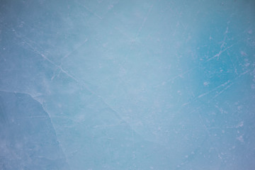 Textured ice blue frozen rink winter background