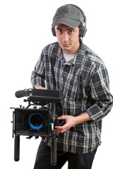 Obraz premium young cameraman with movie camera