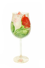 glass with hand mottled floral symbols of napkin