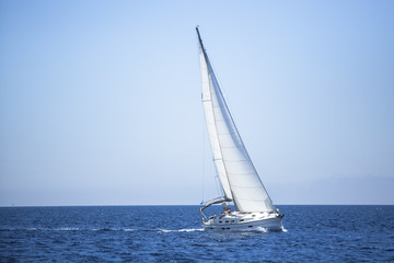Naklejka premium Boat in sailing regatta.