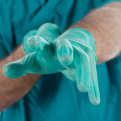 Surgeon wearing gloves