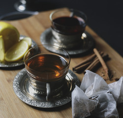 Teacups,cinnamon,spices,ingredients and lemon