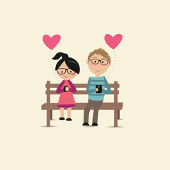lovers sit on the chair and use their smartphone