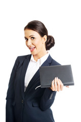 Portrait of businesswoman holding her notes