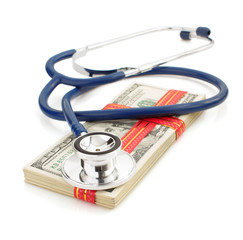 stethoscope and dollars money banknotes