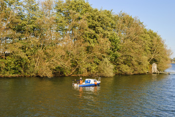 Fototapeta na wymiar Fishing boat in lake
