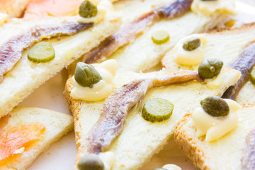 Canapes with anchovy and capers