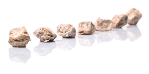 Salted tamarind fruit over white background 