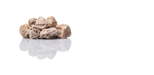Salted tamarind fruit over white background 
