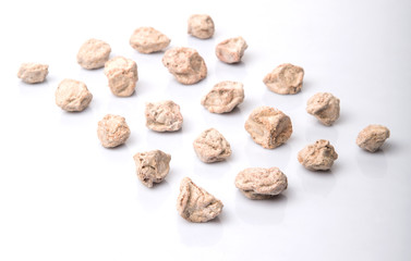 Salted tamarind fruit over white background 