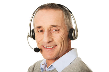 Portrait of call center man wearing a headset